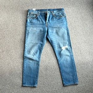 Levi’s 501 T, perfectly distressed.
